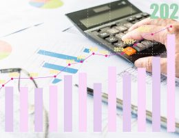 A,Businessman,Is,Calculating,Profit,From,Positive,Business,Growth,Of