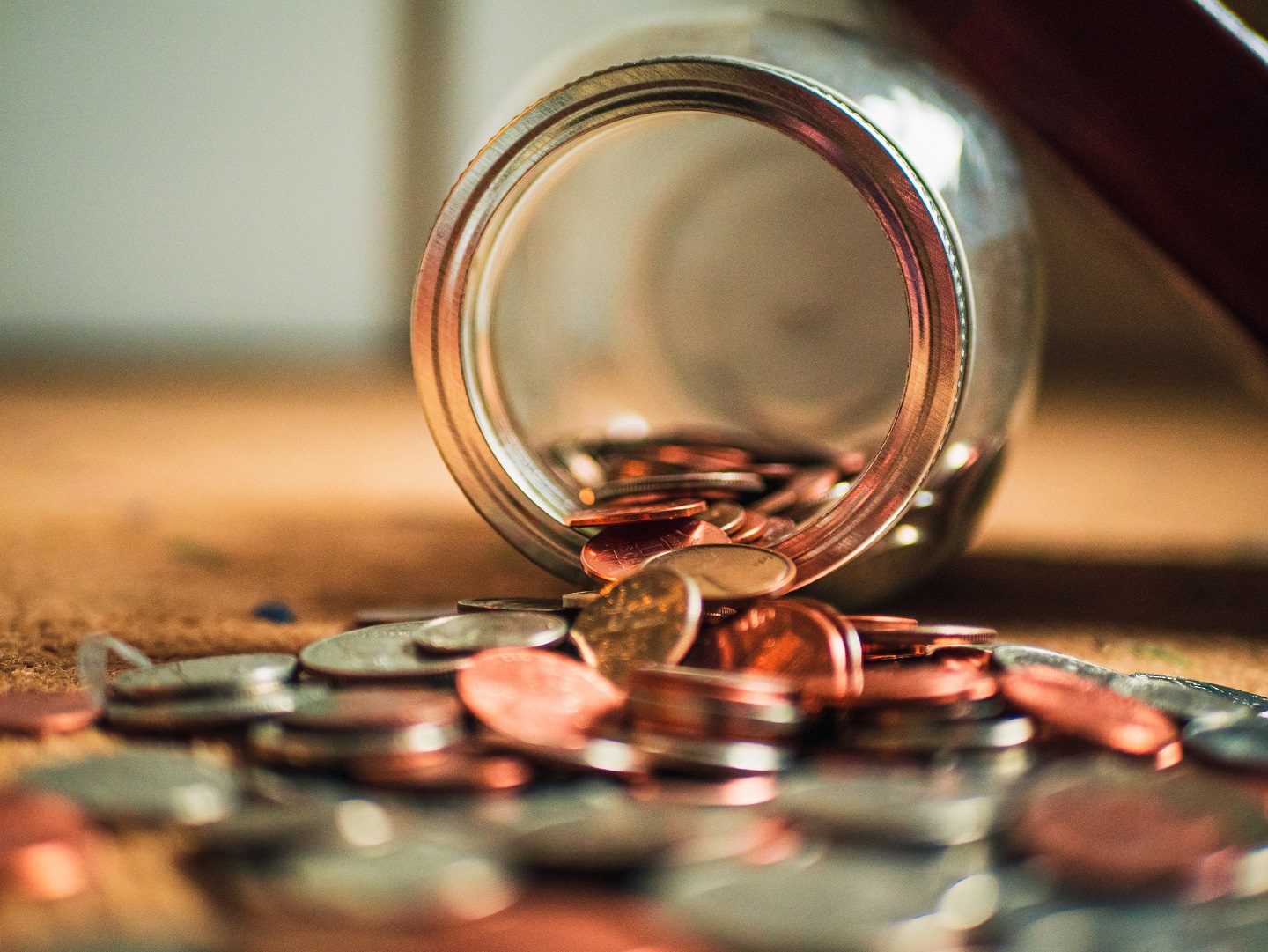 coin poured from a jar