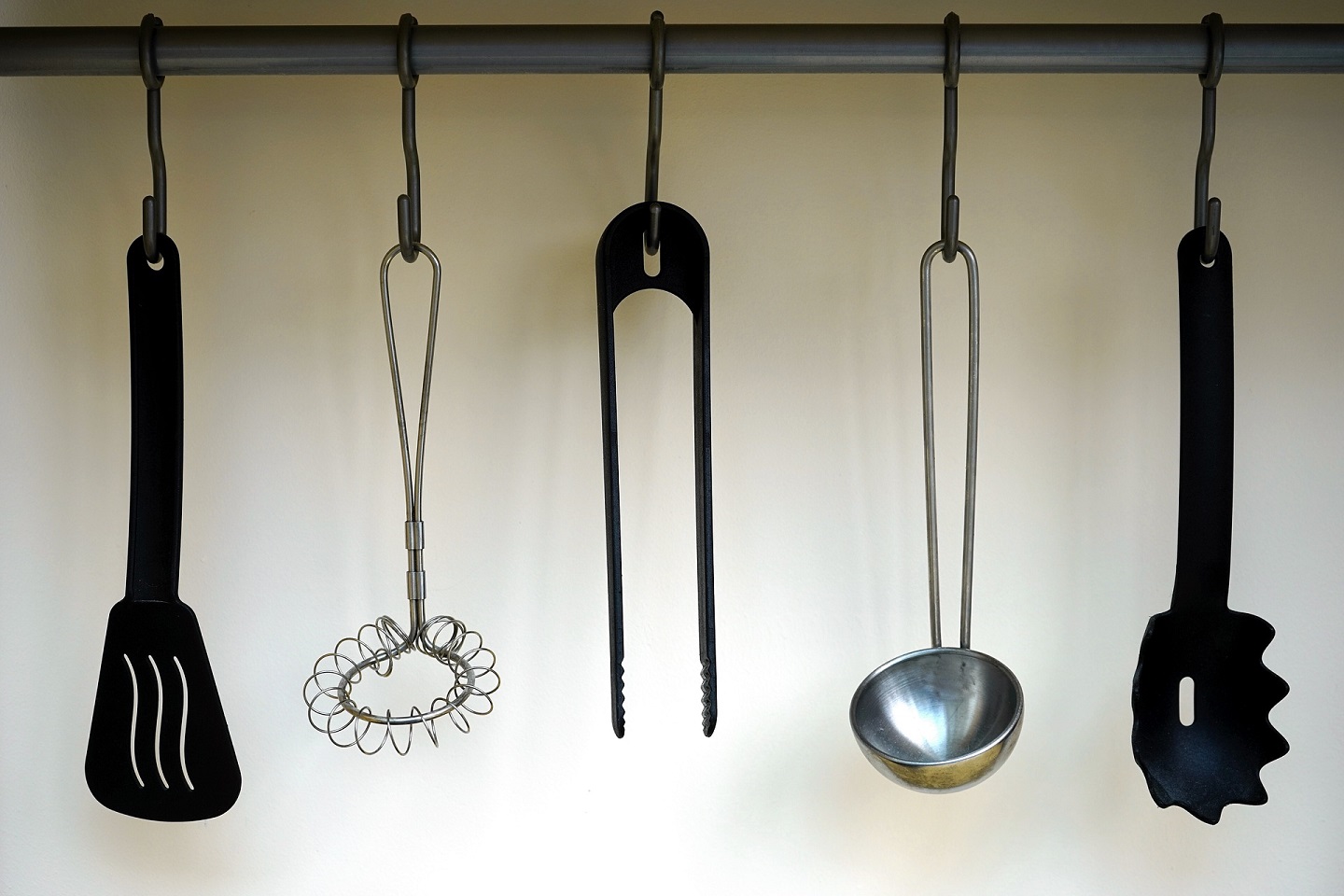 You can use your method of hanging the utensils in the kitchen to save more space